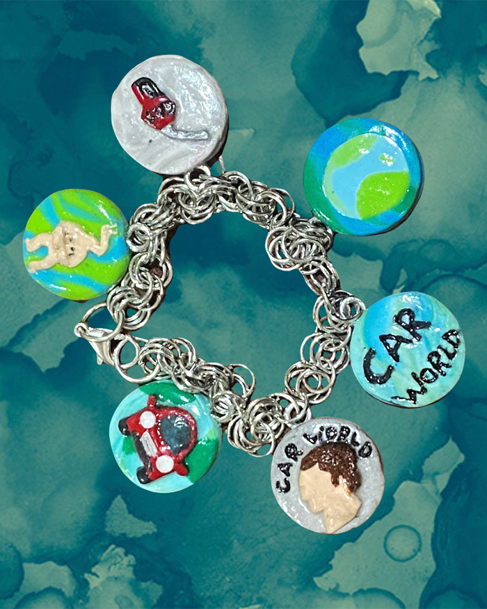 Tat Pass Charm Bracelet